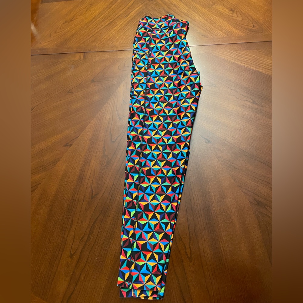 Multicolor EPCOT Ball leggings.